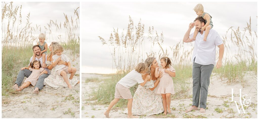 family playing in the sand dunes