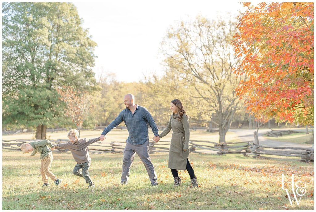 family of 4 walking during New Hampshire fall minis